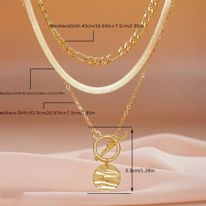 Gold Layered Necklace with Textured Coin Design by Savira