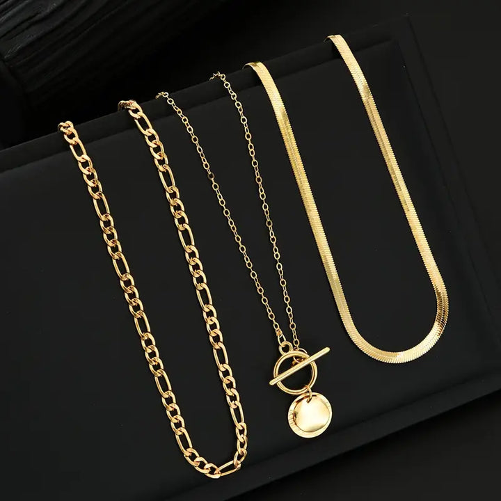 Gold Layered Necklace with Textured Coin Design by Savira