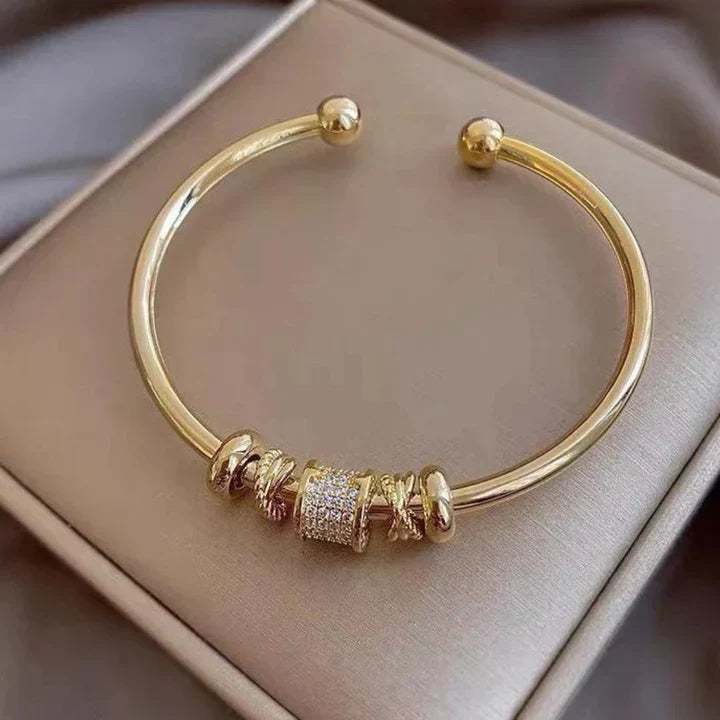 Customizable Bracelet Featuring Golden Charms