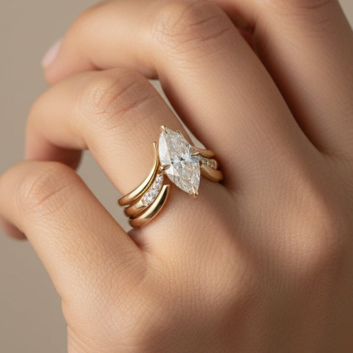 Gold Ring with Drop Crown Design