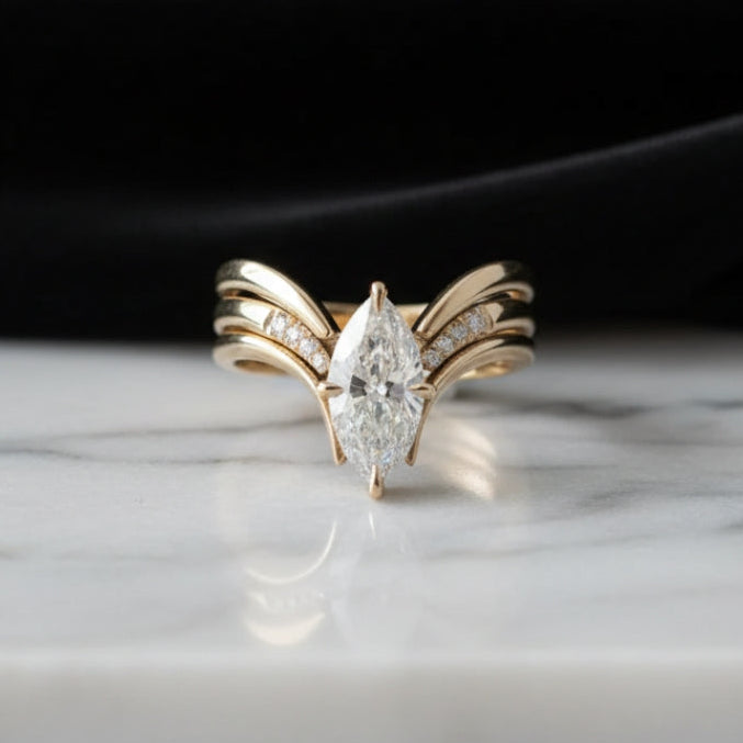 Gold Ring with Drop Crown Design