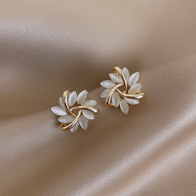 Elegant Gold Earrings Featuring White Opals