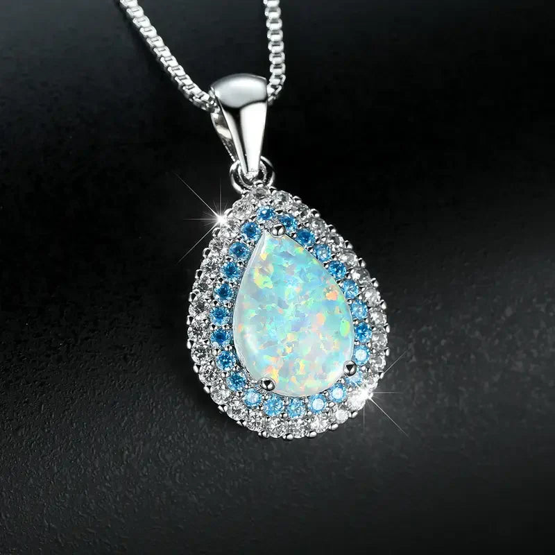 Stunning Blue Opal Drop Necklace with Sparkling Accents in White Gold